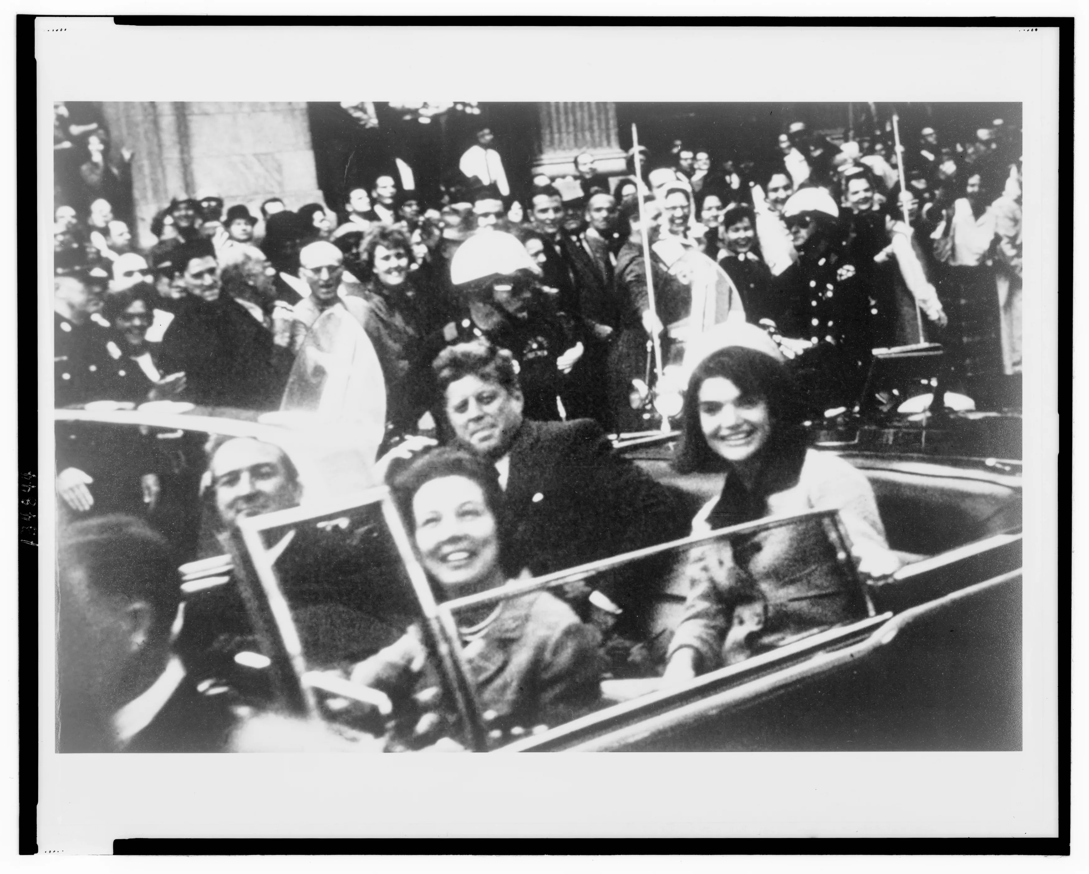 file-handout-image-shows-former-u-s-president-kennedy-and-first-lady-jacqueline-kennedy-riding-in-motorcade-in-dallas