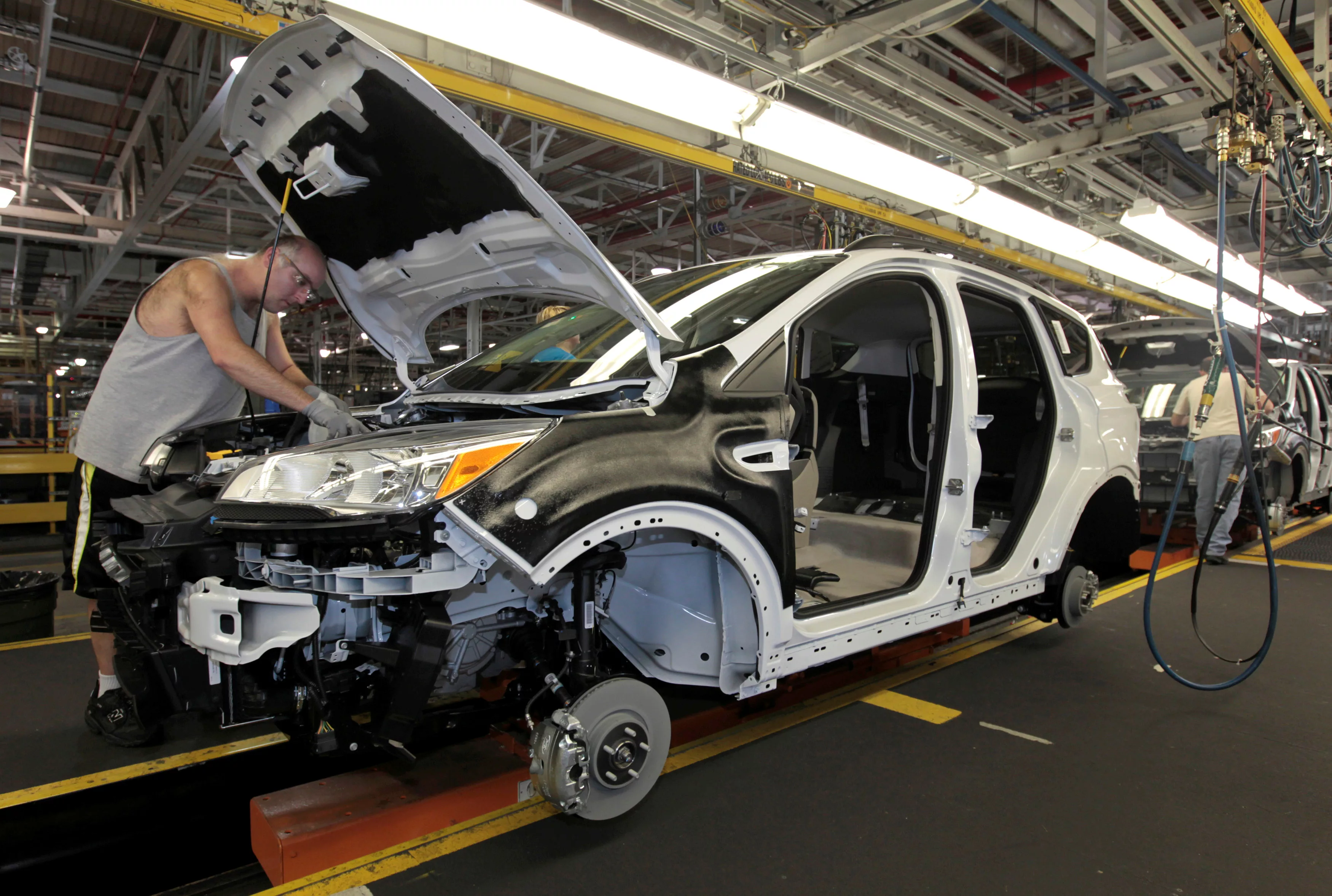 file-photo-of-louisville-assembly-plant-employees-assembling-the-2013-ford-escape-on-the-production-line-in-louisville