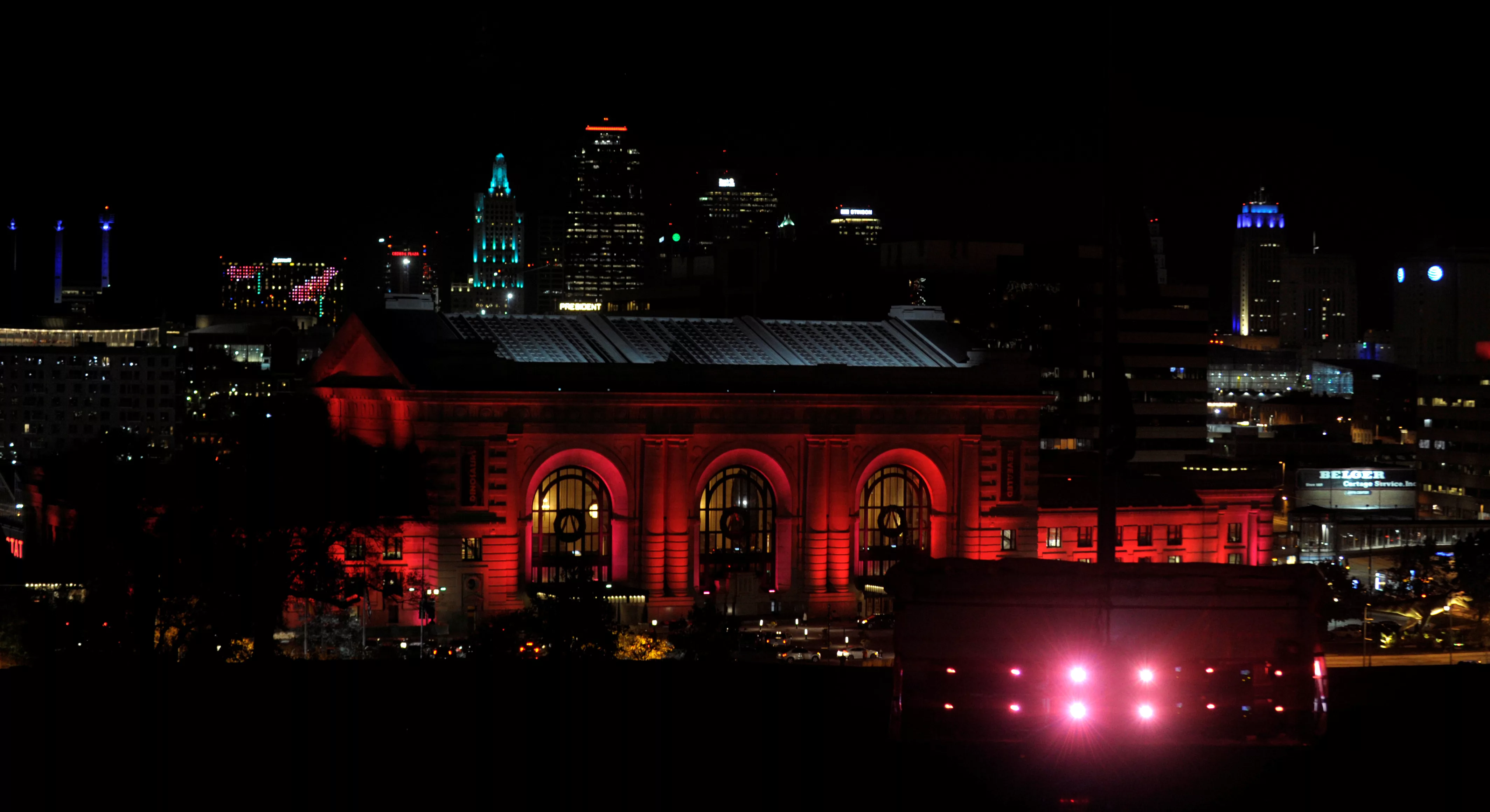 kansas-city-union-station-where-soldiers-from-the-two-world-wars-took-trains-to-the-coasts-is-seen-behind-one-of-the-many-projectors-that-projected-poppies-onto-the-liberty-memorial-of-the-world-war