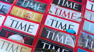 Colorful close-up of overlapping TIME Magazine covers^ highlighting diverse headlines on world leaders^ politics^ business^ and social issues. Calgary^ Alberta^ Canada. Dec 1^ 2025