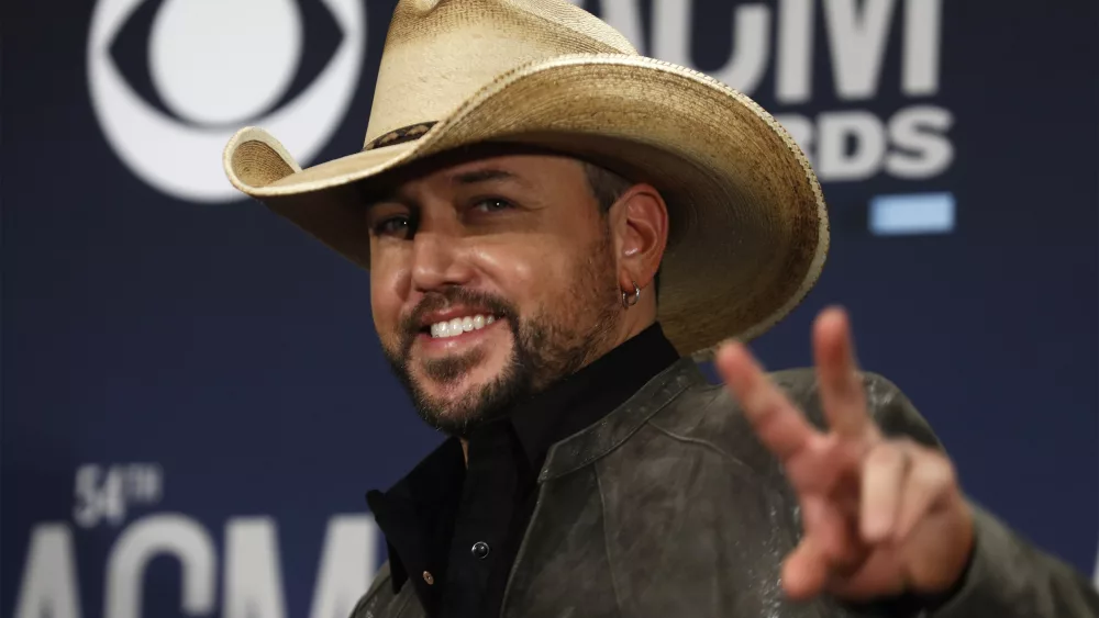 54th-academy-of-country-music-awards-photo-room-las-vegas-nevada-u-s-april-7-2019-jason-aldean-poses-backstage-with-his-artist-of-the-decade-award
