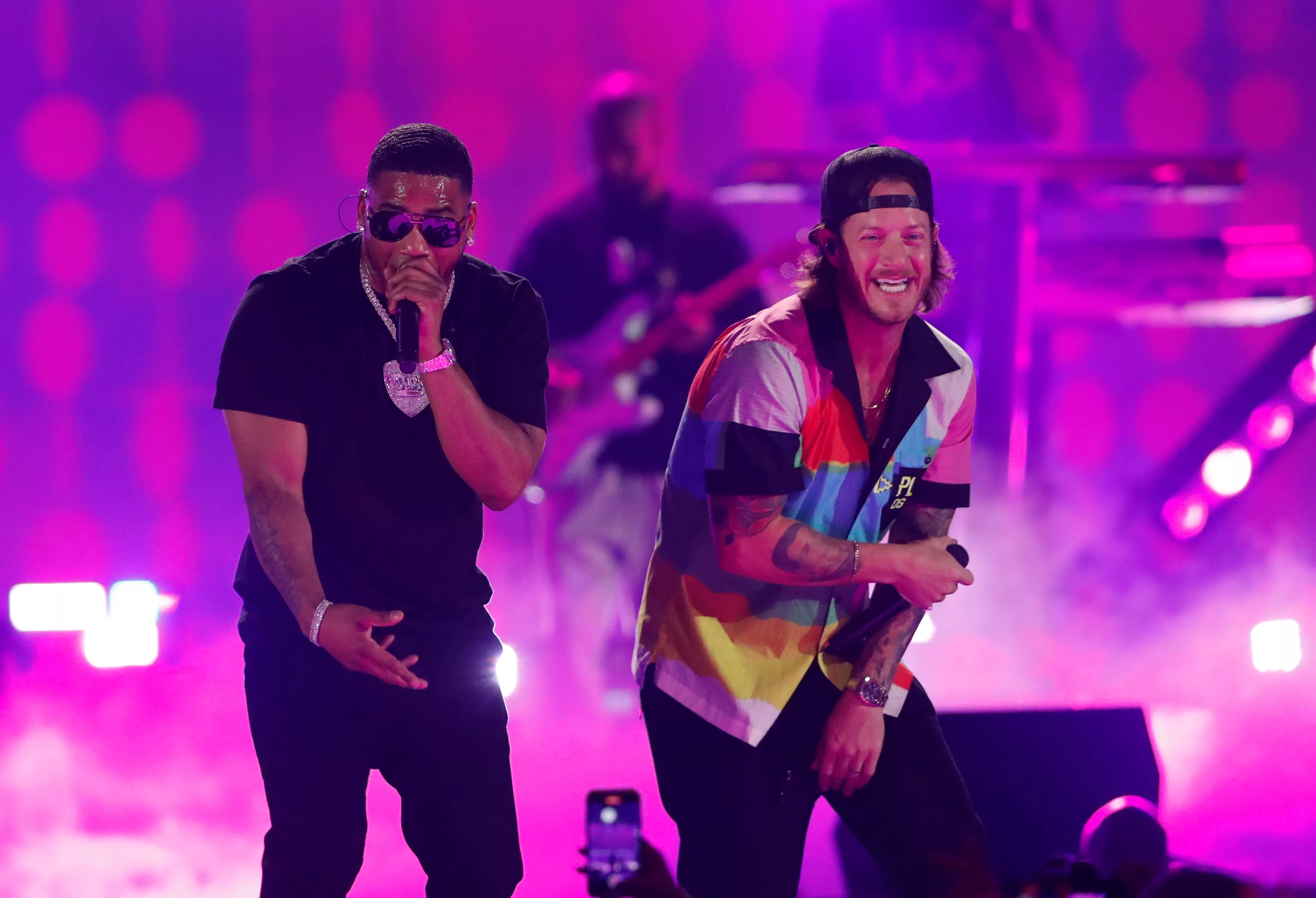 nelly-performs-with-tyler-hubbard-during-the-first-day-of-the-iheartradio-music-festival-at-t-mobile-arena-in-las-vegas
