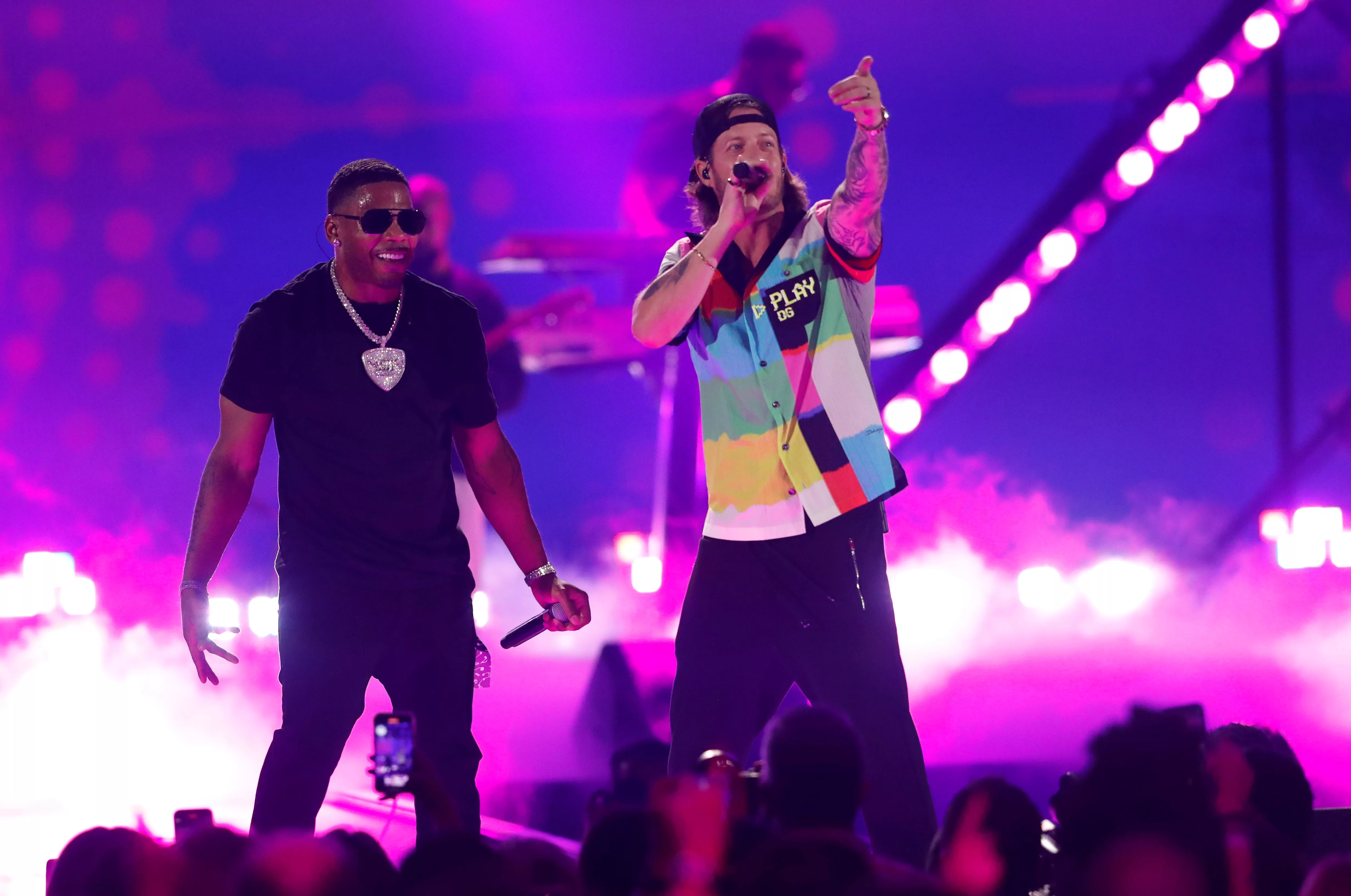 nelly-performs-with-tyler-hubbard-during-the-first-day-of-the-iheartradio-music-festival-at-t-mobile-arena-in-las-vegas-2