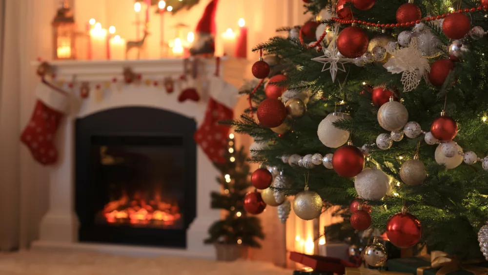 festive-living-room-interior-with-christmas-tree-near-fireplace