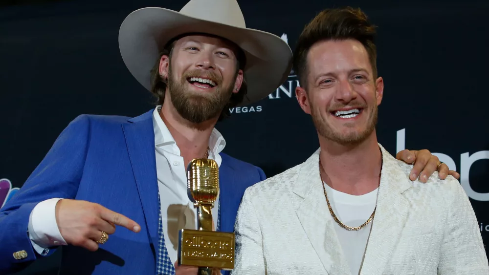 2019-billboard-music-awards-photo-room-las-vegas-nevada-u-s-may-1-2019-kelley-and-hubbard-of-florida-georgia-line-pose-backstage-with-their-top-country-song-award-for