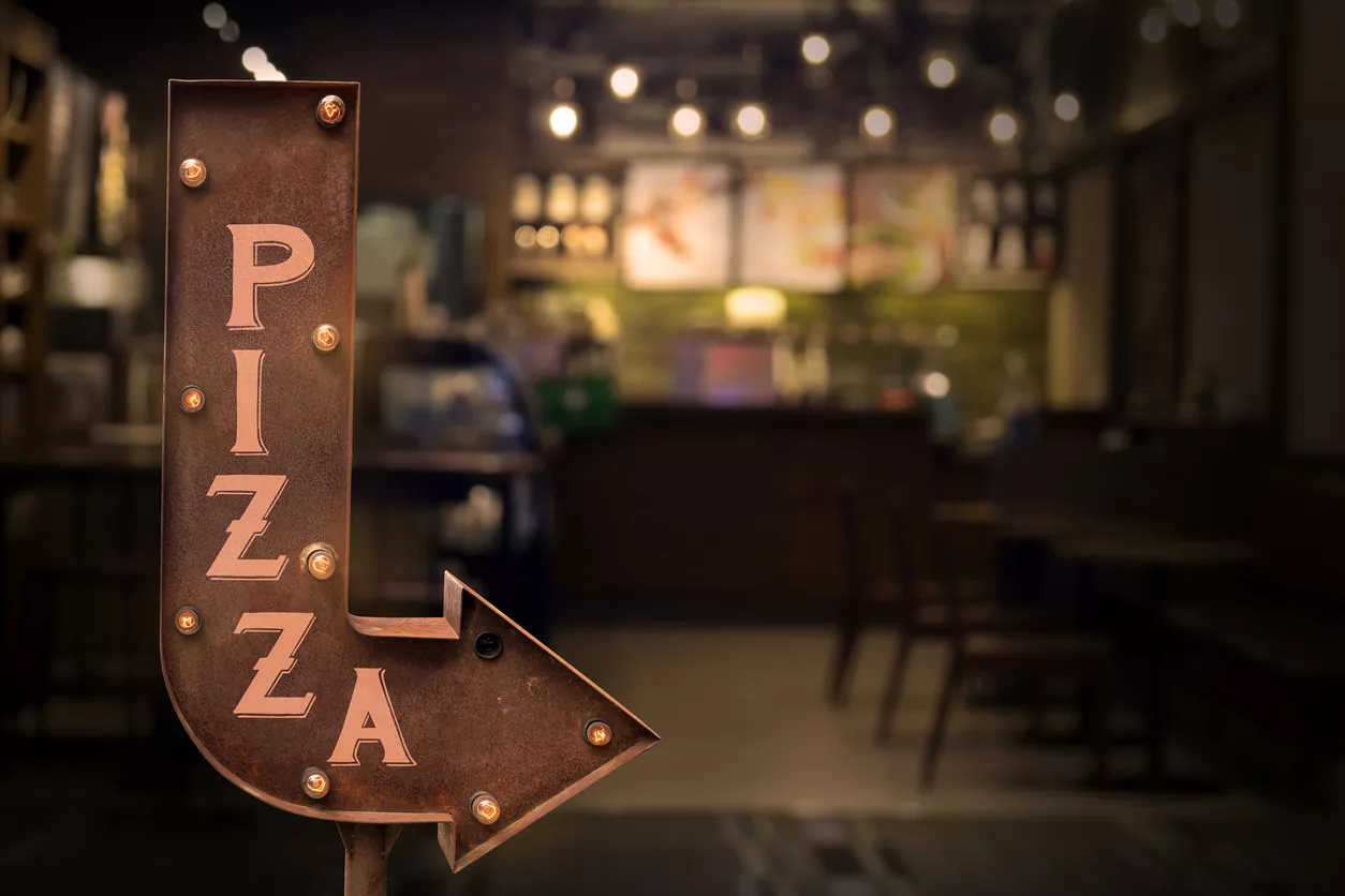 pizza-shop-signboard-in-front-of-the-store