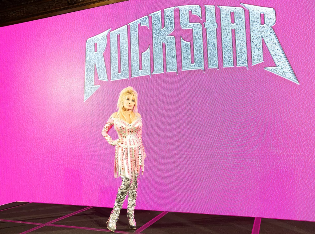 WATCH: Dolly Parton Surprises Fan With Colon Cancer To Check Off An Item On His Bucket List