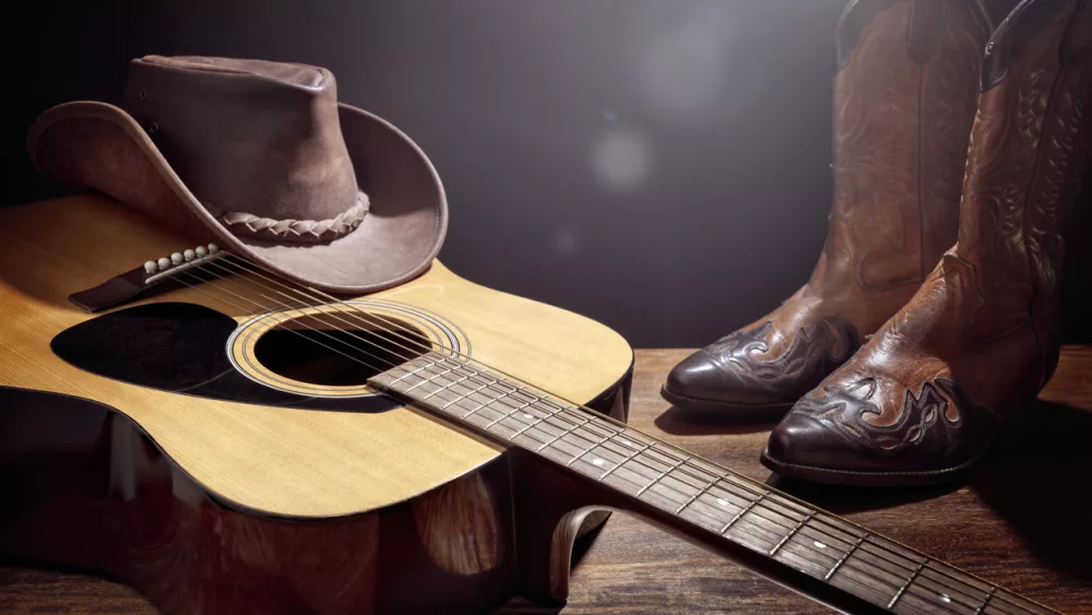 country-music-festival-live-concert-with-acoustic-guitar-cowboy-hat-and-boots