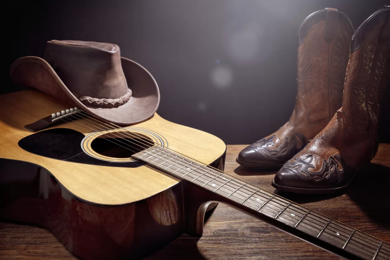 country-music-festival-live-concert-with-acoustic-guitar-cowboy-hat-and-boots