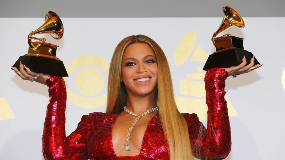 beyonce-holds-the-awards-she-won-at-the-59th-annual-grammy-awards-in-los-angeles
