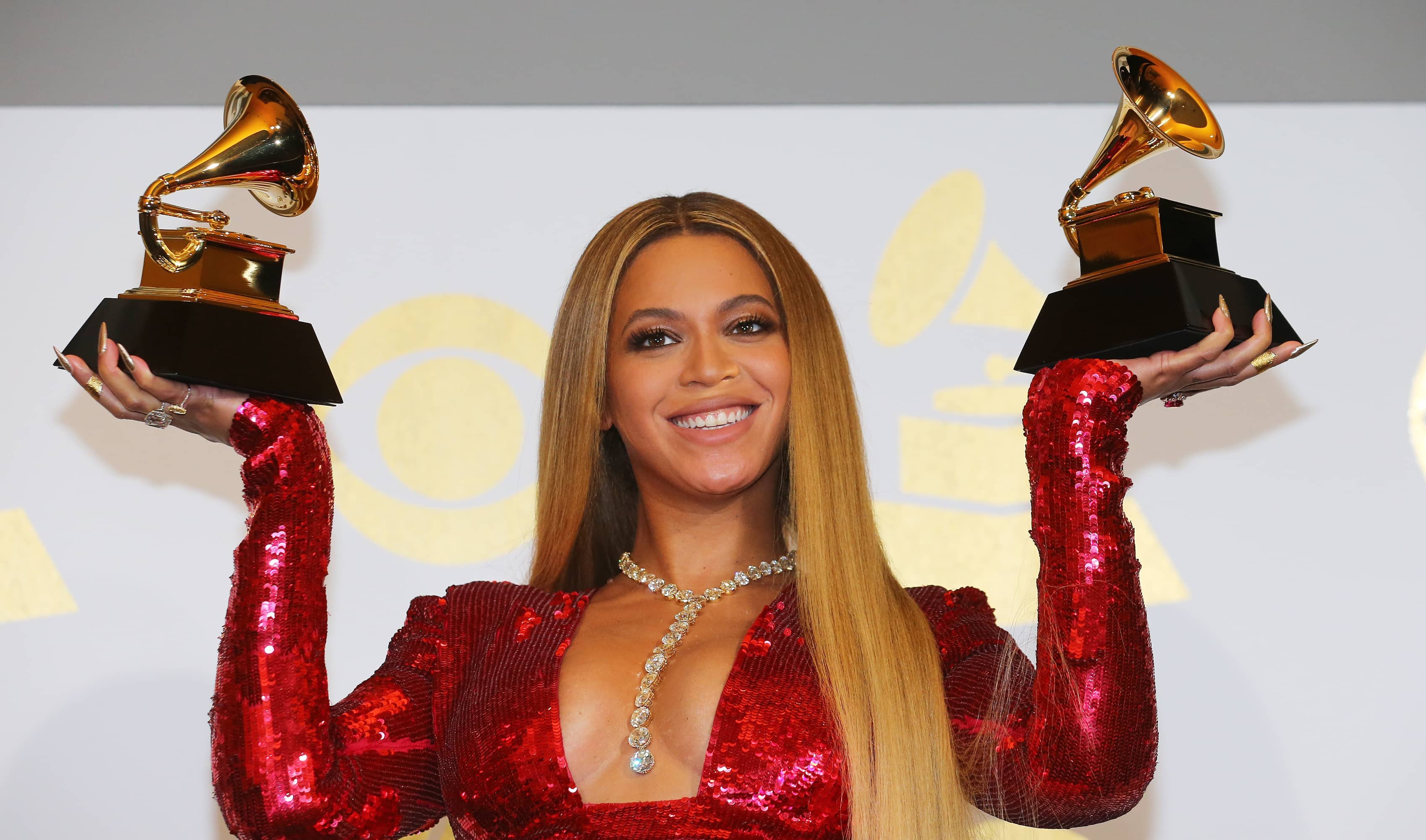 beyonce-holds-the-awards-she-won-at-the-59th-annual-grammy-awards-in-los-angeles
