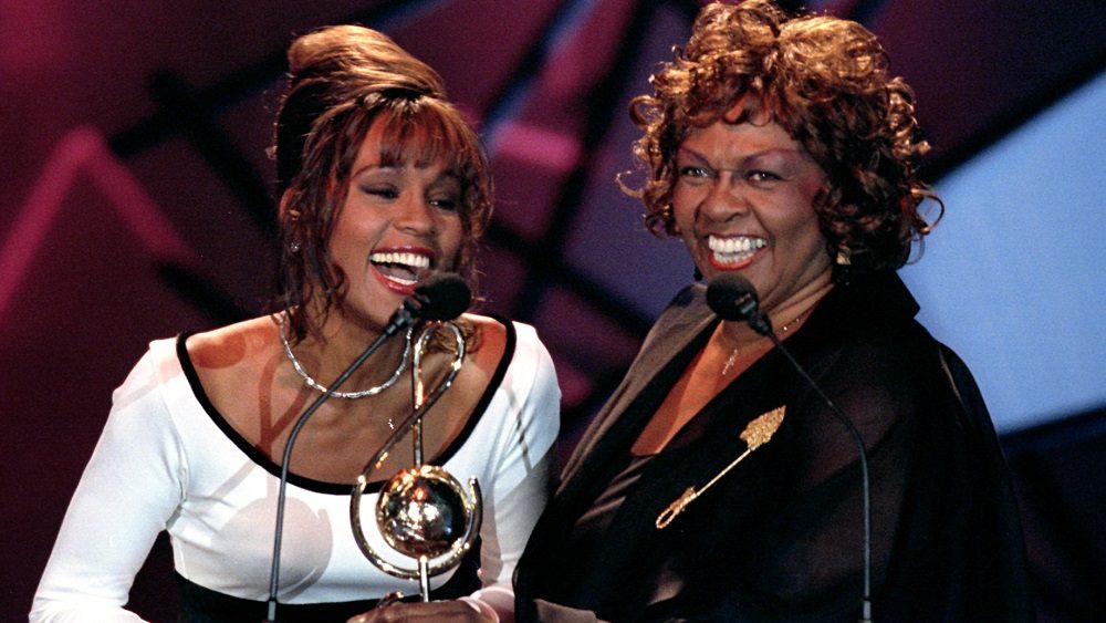 american-singer-and-actress-whitney-houston-l-smiles-as-she-receives-from-her-mother-the-second-of