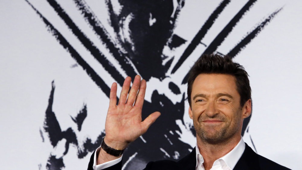 actor-hugh-jackman-waves-to-fans-as-he-attends-the-japan-premiere-of-his-movie-the-wolverine-in-tokyo