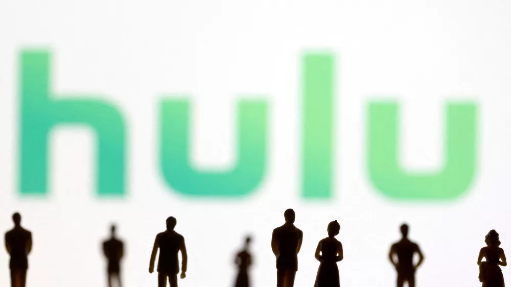 file-photo-toy-figures-of-people-are-seen-in-front-of-the-displayed-hulu-logo-in-this-illustration