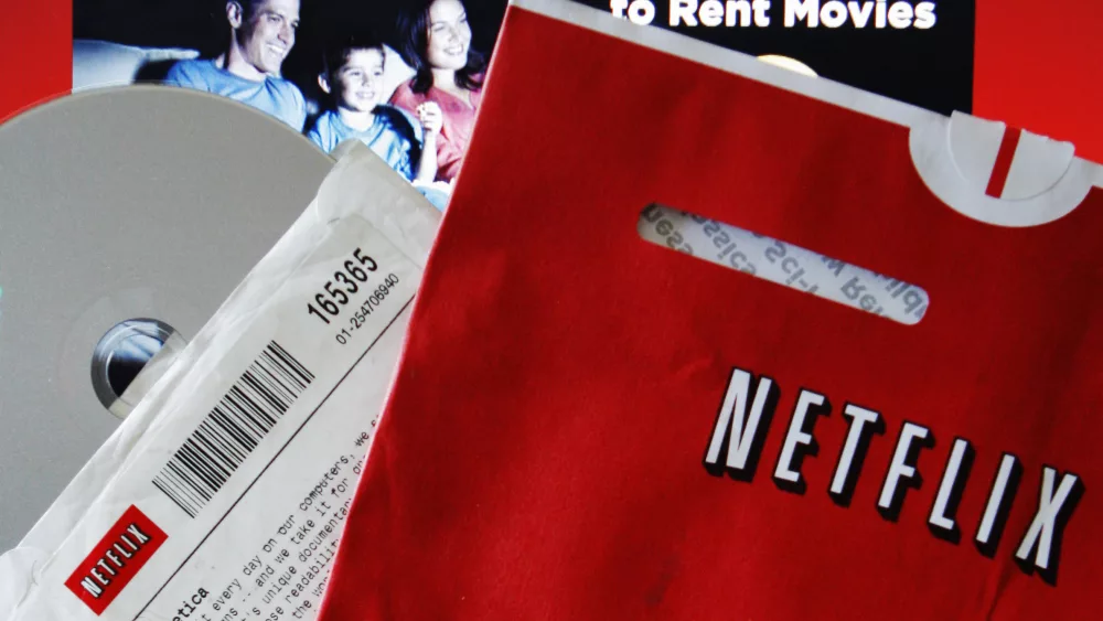 file-photo-of-dvd-rental-and-screen-shot-of-netflix-website