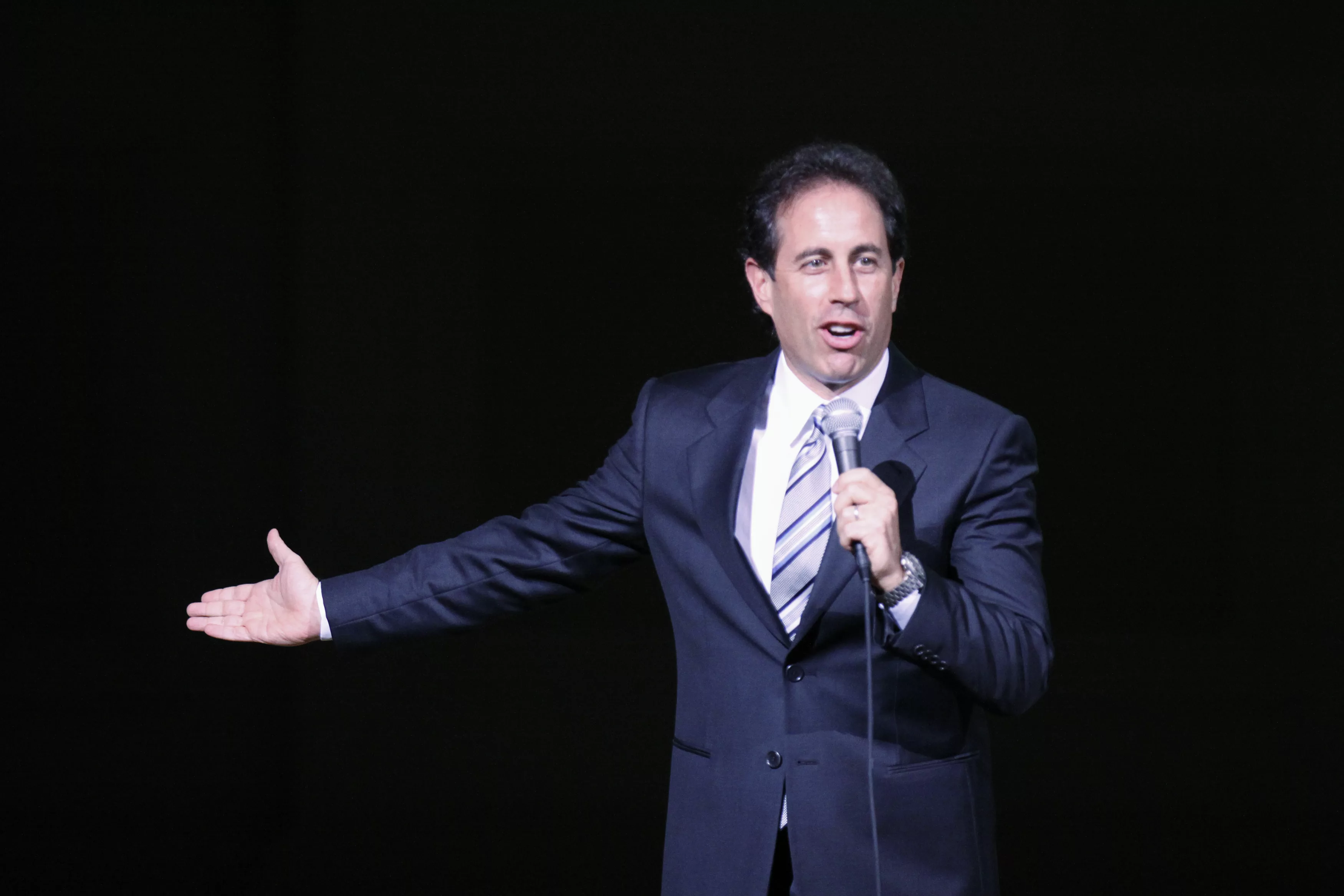 comedian-jerry-seinfeld-is-seen-on-stage-while-he-performs-at-a-benefit-concert-for-autism-speaks-in-new-york