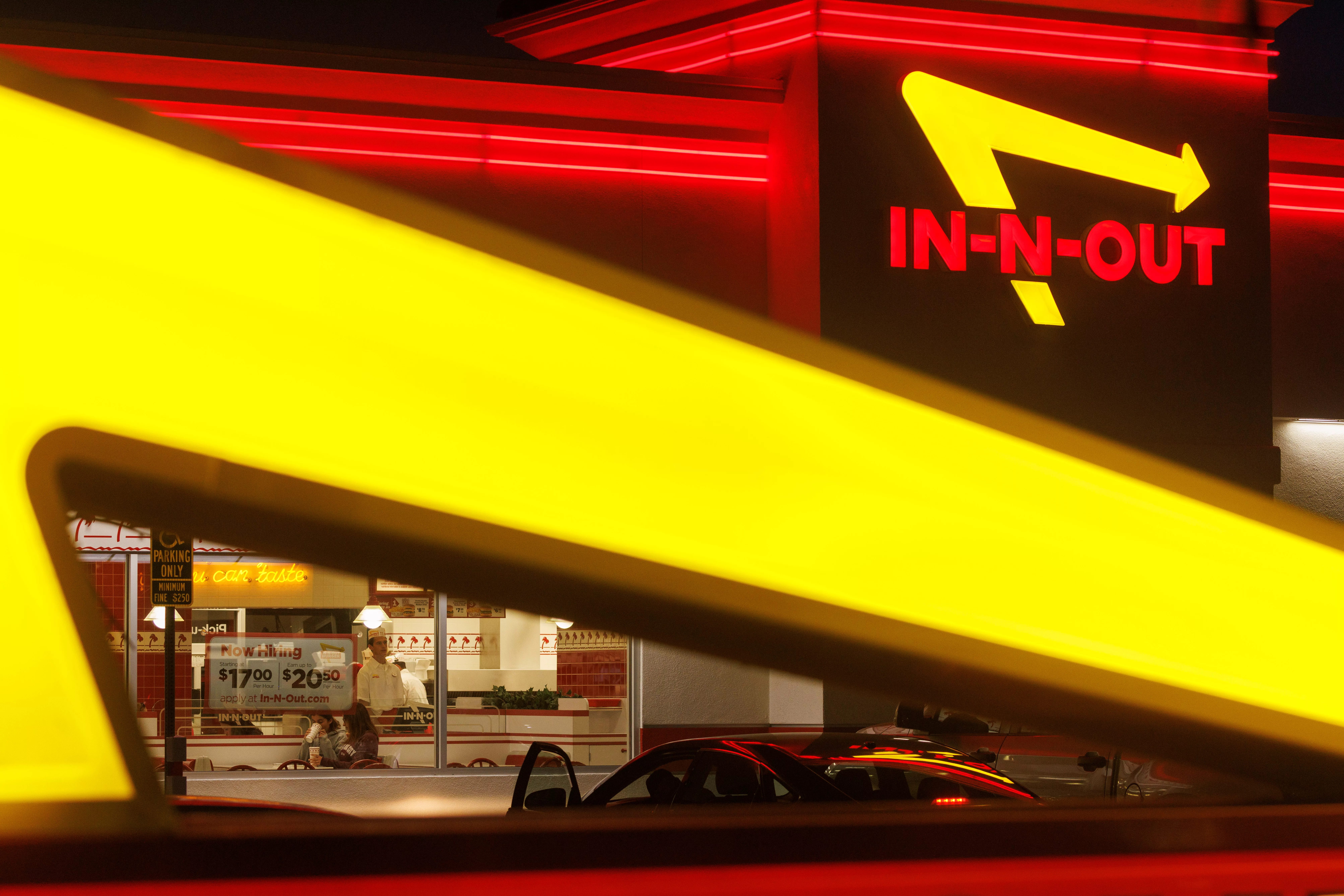now-hiring-sign-displayed-at-a-fast-food-restaurant-in-california