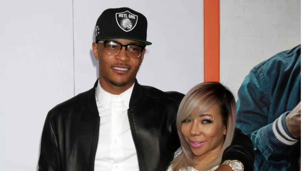 Clifford Harris Jr (aka T.I.) and wife Tameka Cottle-Harris^ (aka Tiny) at the TCL Chinese Theater on March 25^ 2015 in Los Angeles^ CA