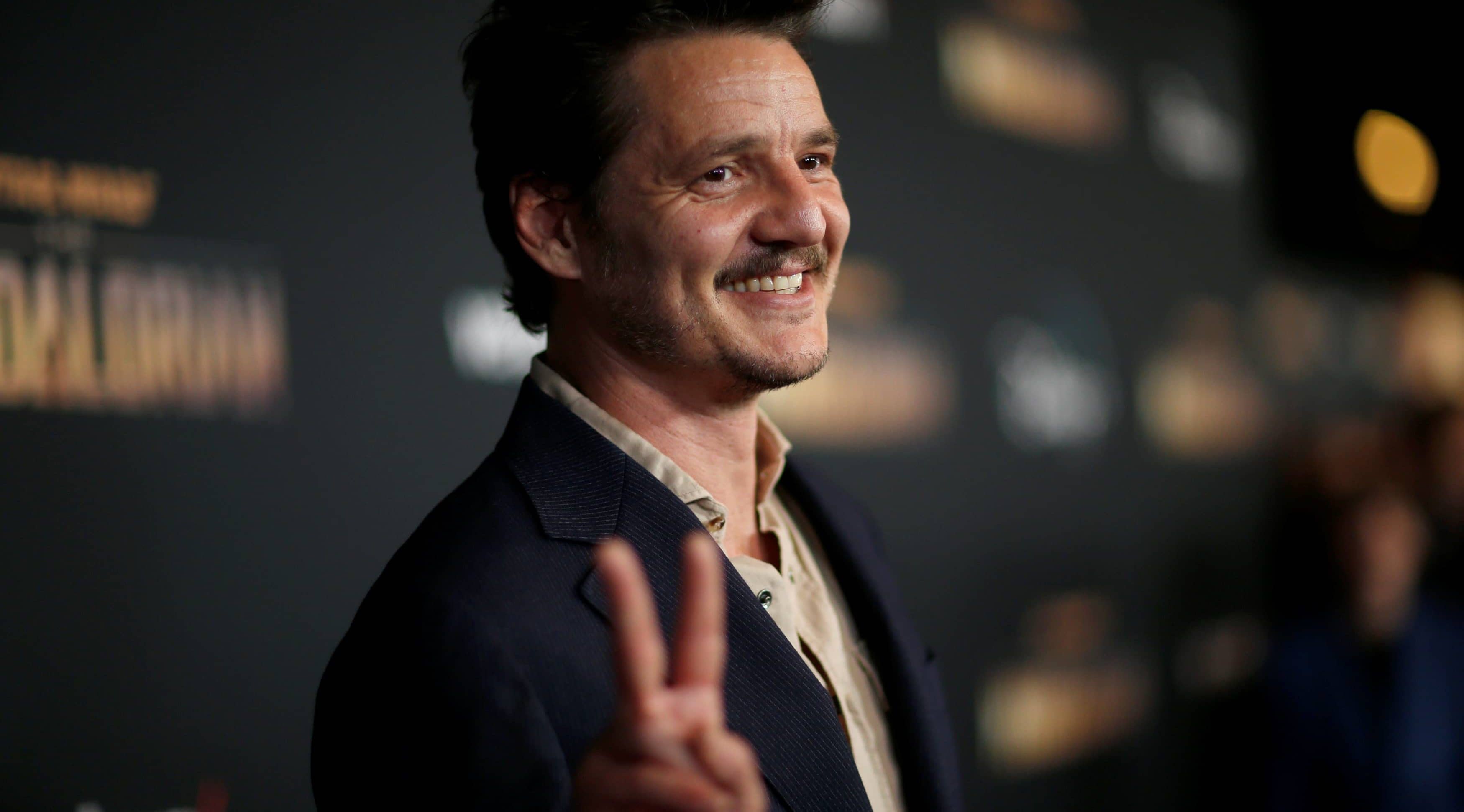 cast-member-pascal-poses-at-the-premiere-for-the-television-series-the-mandalorian-in-los-angeles