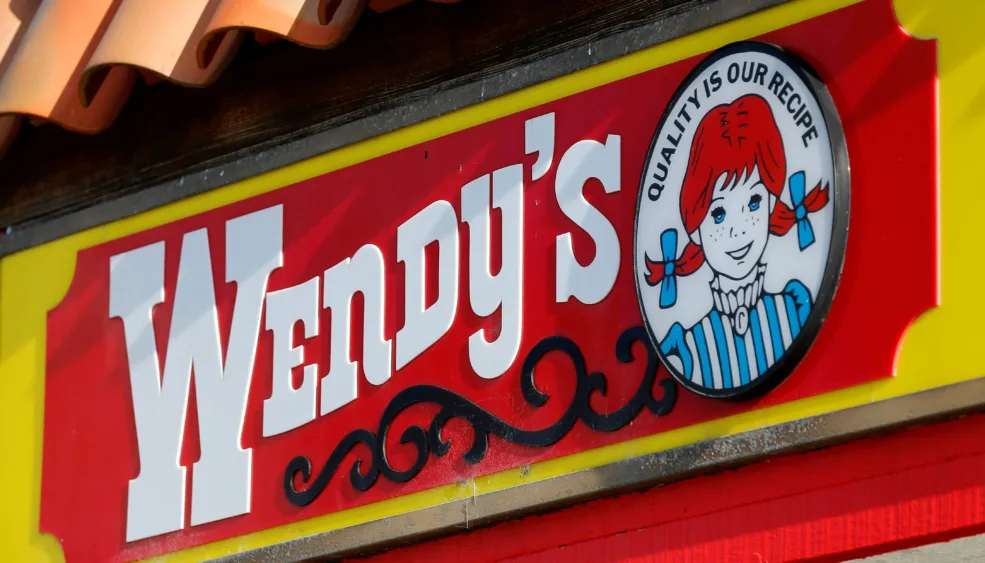 a-wendys-sign-and-logo-are-shown-at-one-of-the-companys-restaurant-in-encinitas-california