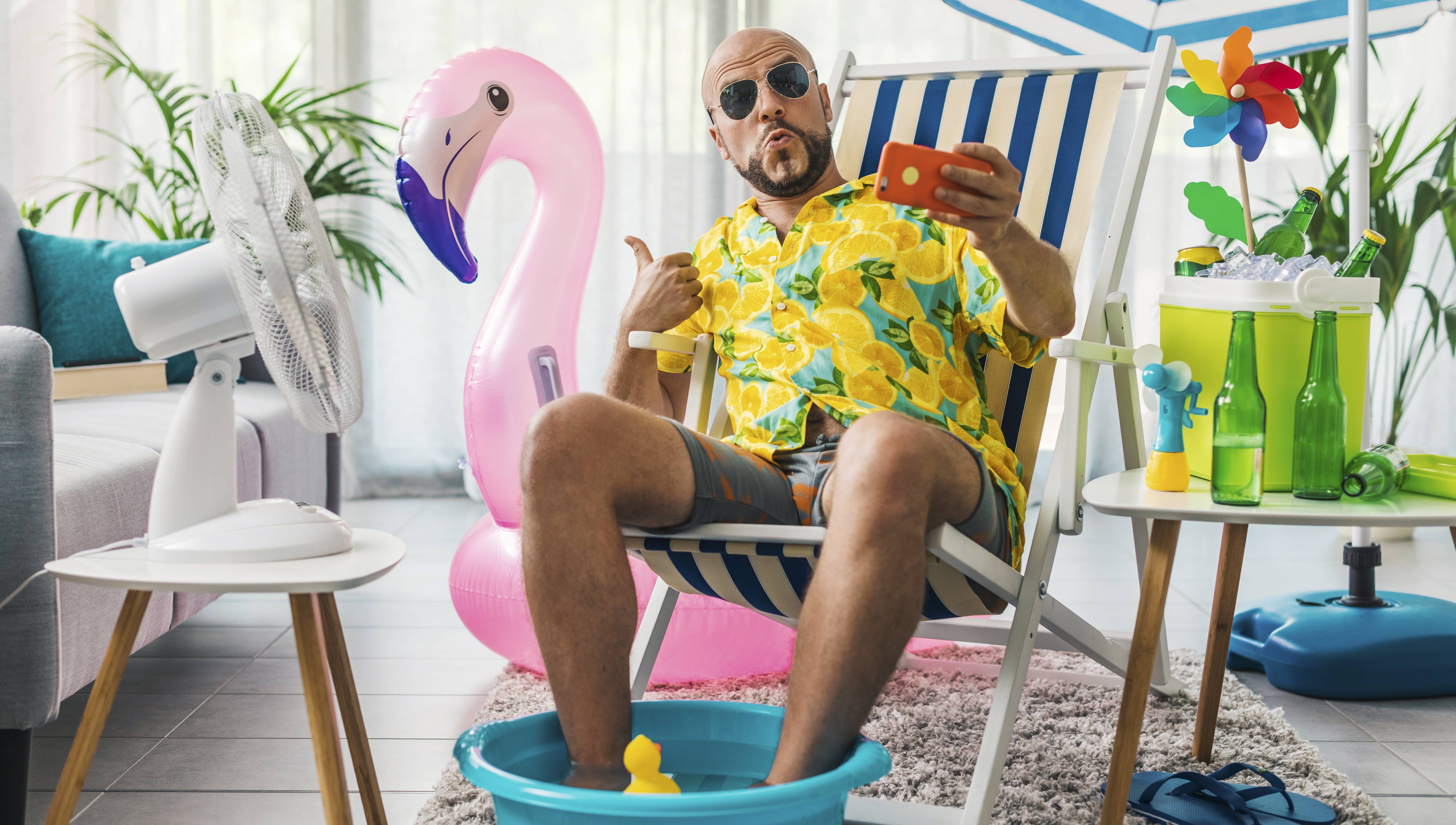 man-spending-summer-vacations-at-home-and-taking-selfies