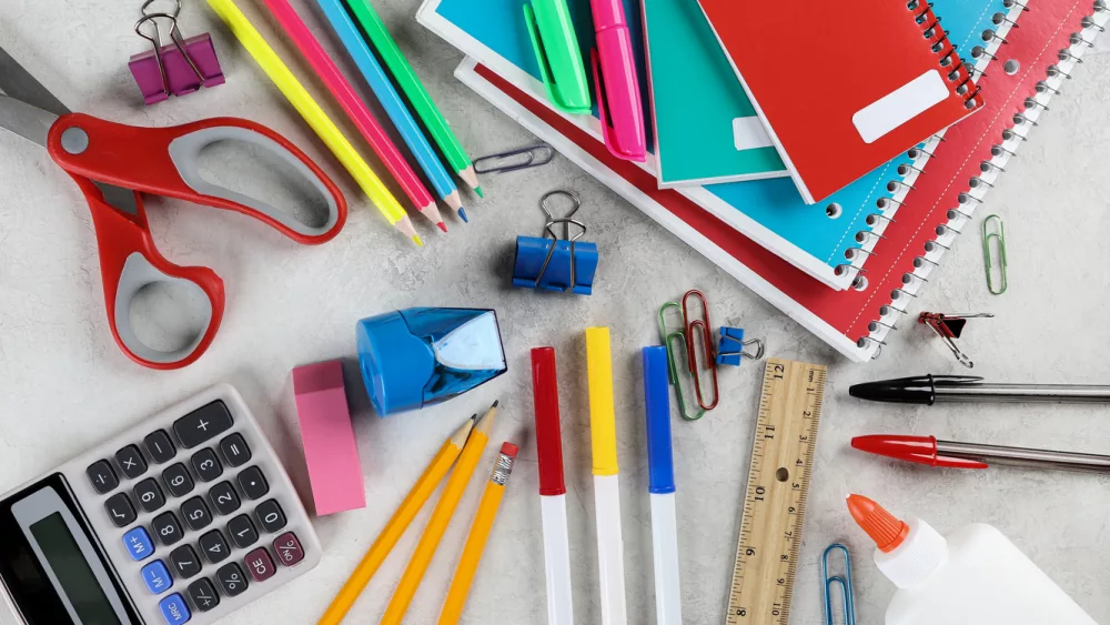 assortment-of-school-supplies-on-a-table