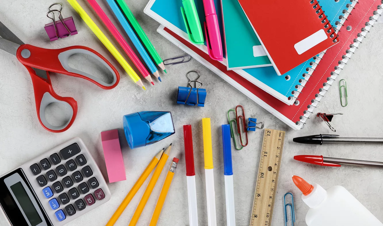 assortment-of-school-supplies-on-a-table