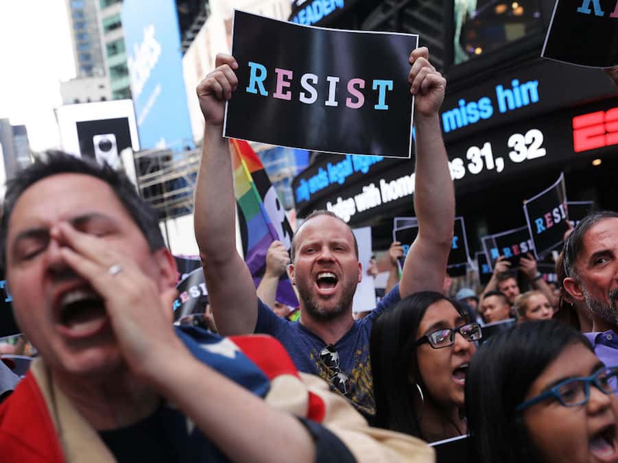 anti-trump-protesters-demonstrate-in-times-square-against-trump-announcement-of-banning-lgbt-service-members