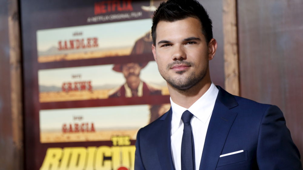 cast-member-lautner-poses-at-the-premiere-of-the-ridiculous-6-in-universal-city