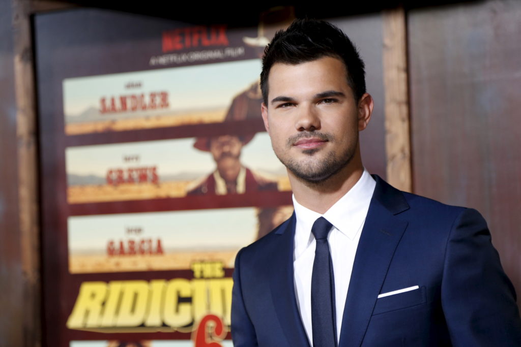 cast-member-lautner-poses-at-the-premiere-of-the-ridiculous-6-in-universal-city
