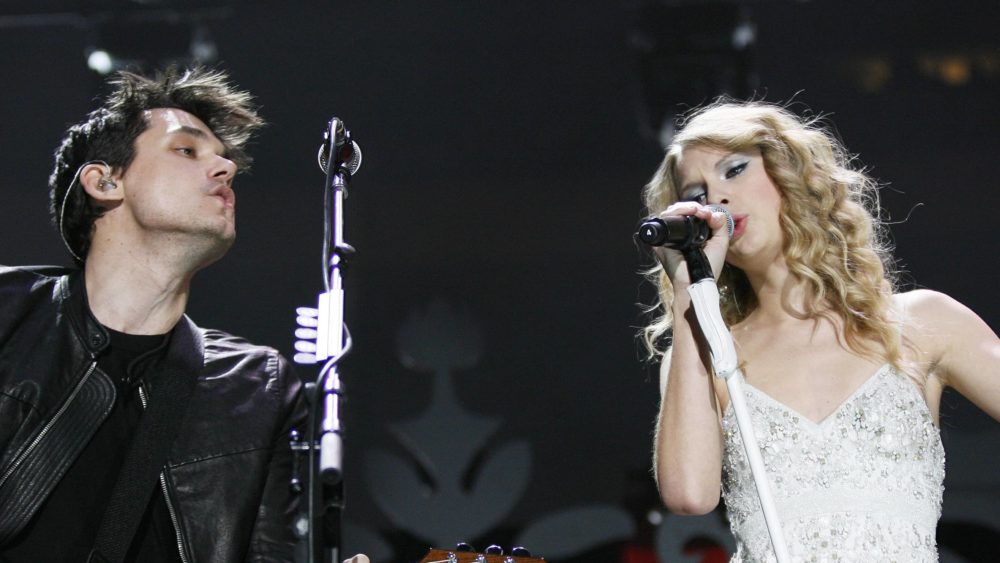 singer-taylor-swift-performs-with-john-mayer-during-the-z100-jingle-ball-in-new-york