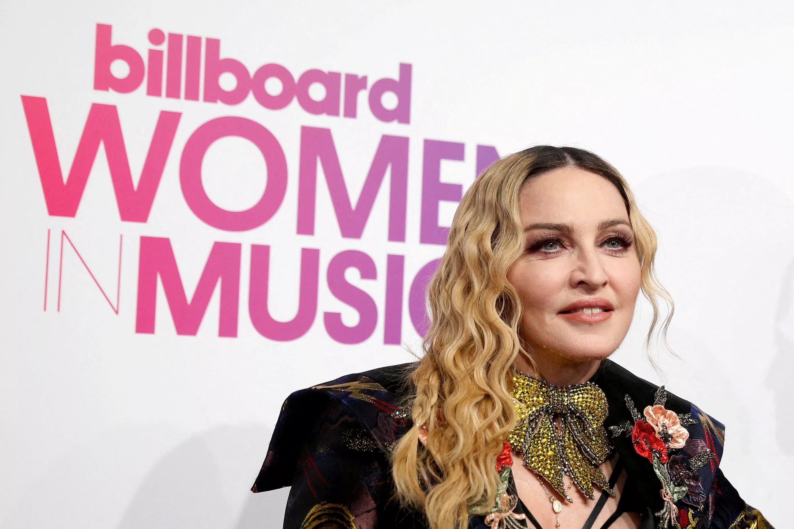 file-photo-madonna-poses-on-the-red-carpet-a-the-billboard-magazines-11th-annual-women-in-music-luncheon-in-new-york