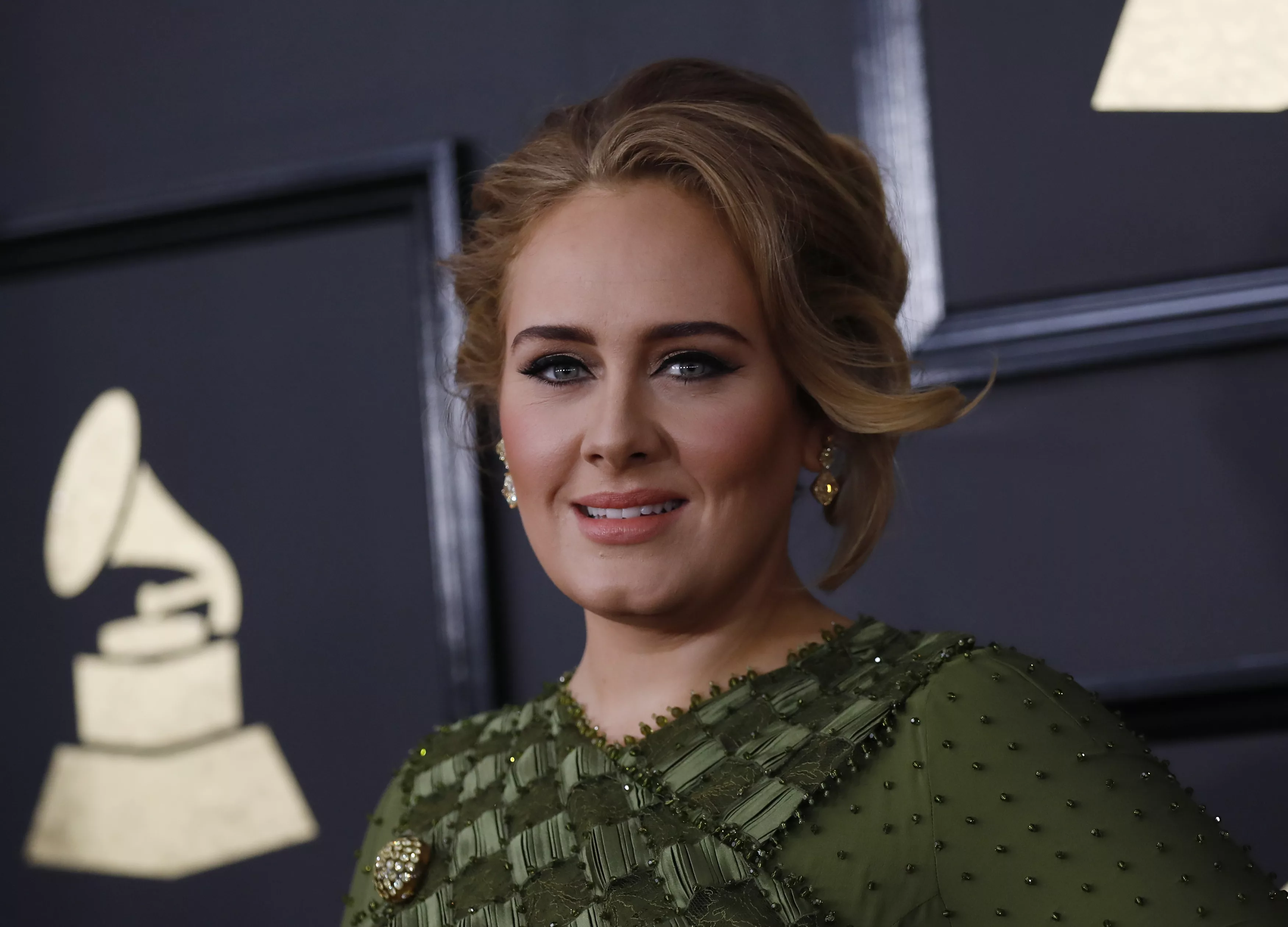 singer-adele-arrives-at-the-59th-annual-grammy-awards-in-los-angeles