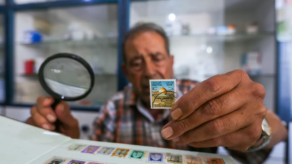 gaza-73-year-old-pharmacists-collects-thousands-of-stamps-as-his-lifetime-hobby