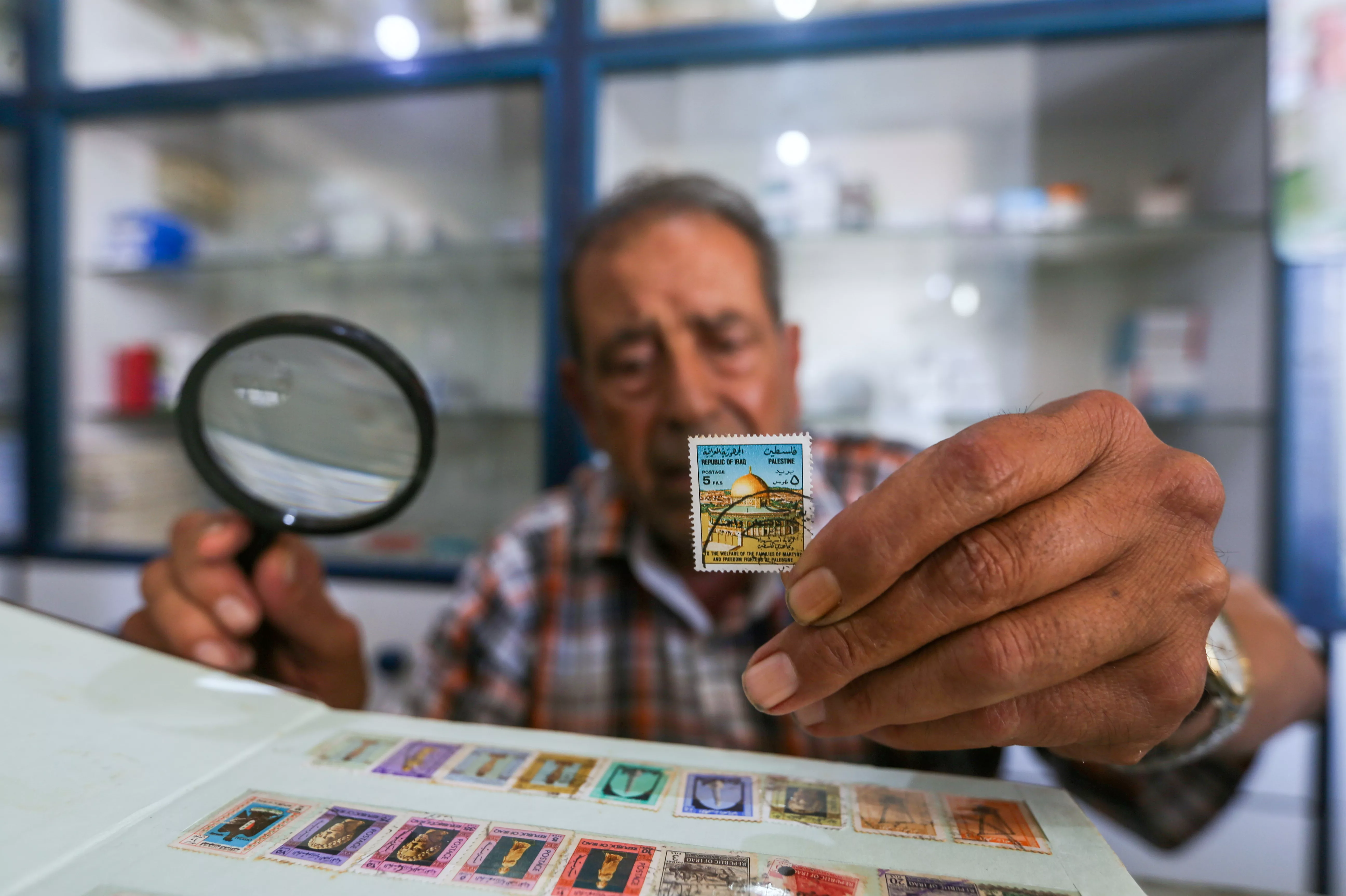 gaza-73-year-old-pharmacists-collects-thousands-of-stamps-as-his-lifetime-hobby