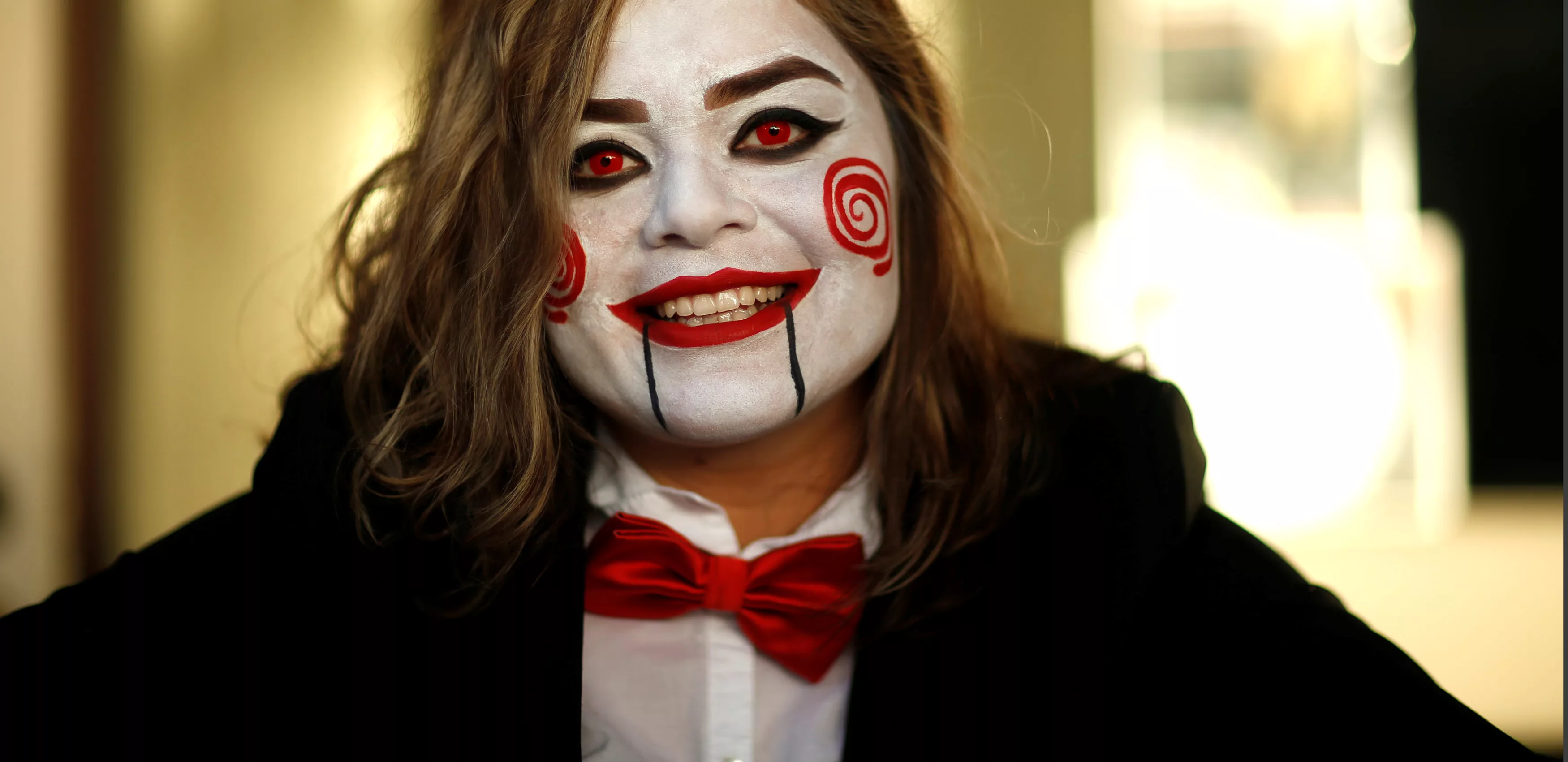 person-dressed-up-as-jigsaw-poses-during-a-halloween-event-in-sierra-madre