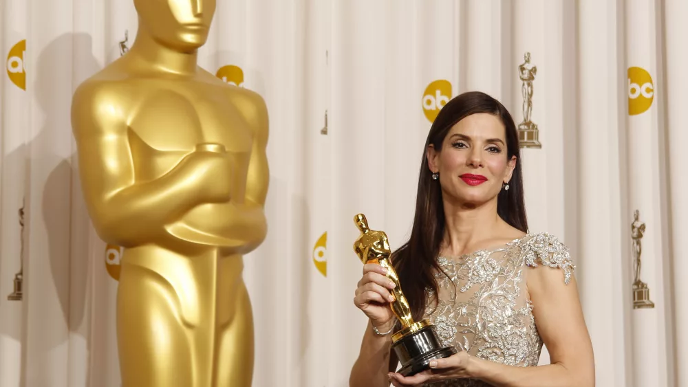 best-actress-winner-sandra-bullock-from-the-film-the-blind-side-displays-her-oscar-at-the-82nd-academy-awards-in-hollywood