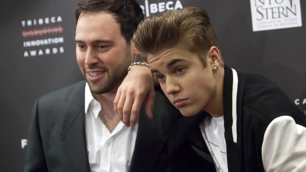 scooter-braun-and-justin-bieber-attend-the-3rd-annual-tribeca-disruptive-innovation-awards-during-the-2012-tribeca-film-festival-in-new-york