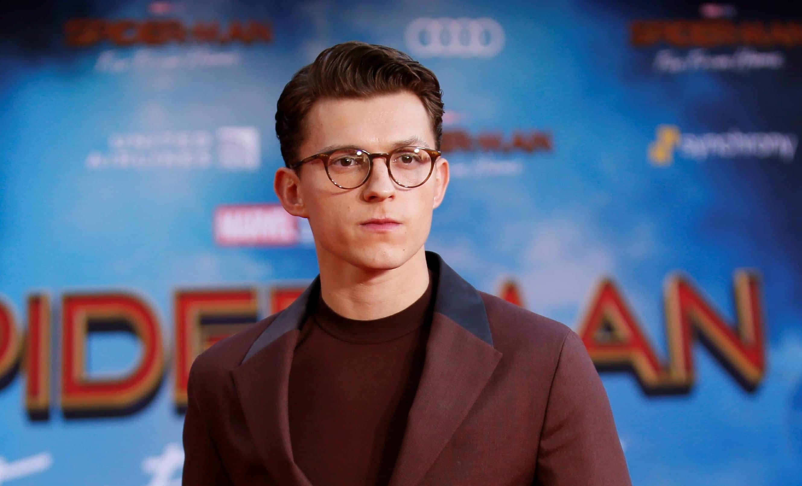 actor-tom-holland-poses-at-the-world-premiere-of-marvel-studios-spider-man-far-from-home-in-los-angeles