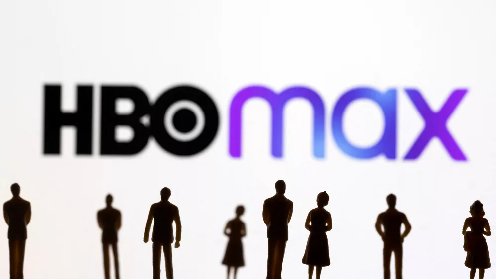 toy-figures-of-people-are-seen-in-front-of-the-displayed-hbo-max-logo-in-this-illustration-2