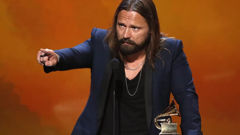 max-martin-accepts-the-award-for-producer-of-the-year-non-classical-during-the-pre-telecast-awards-at-the-57th-annual-grammy-awards-in-los-angeles