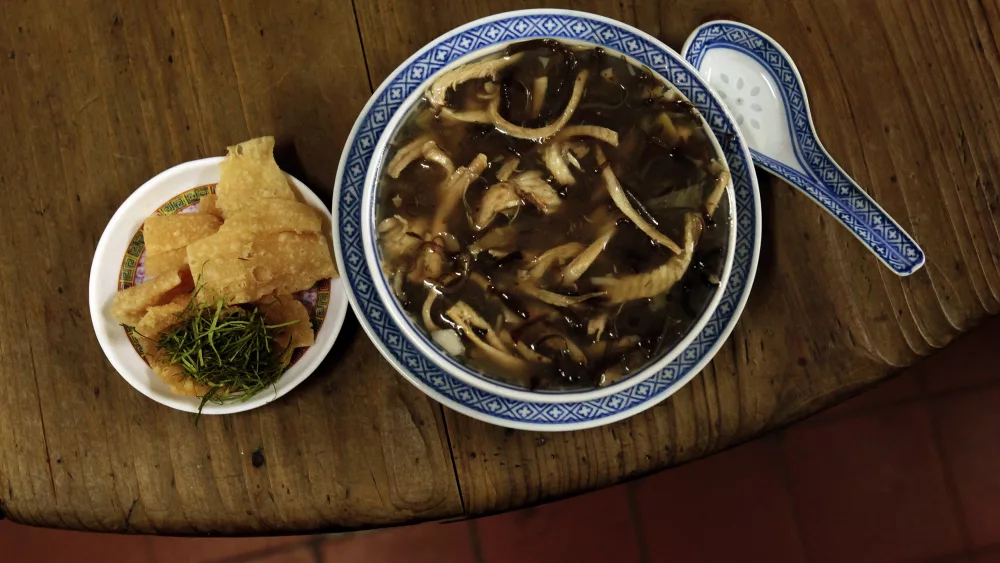 snake-meat-is-seen-in-a-bowl-of-snake-soup-served-at-a-snake-soup-shop-in-hong-kong