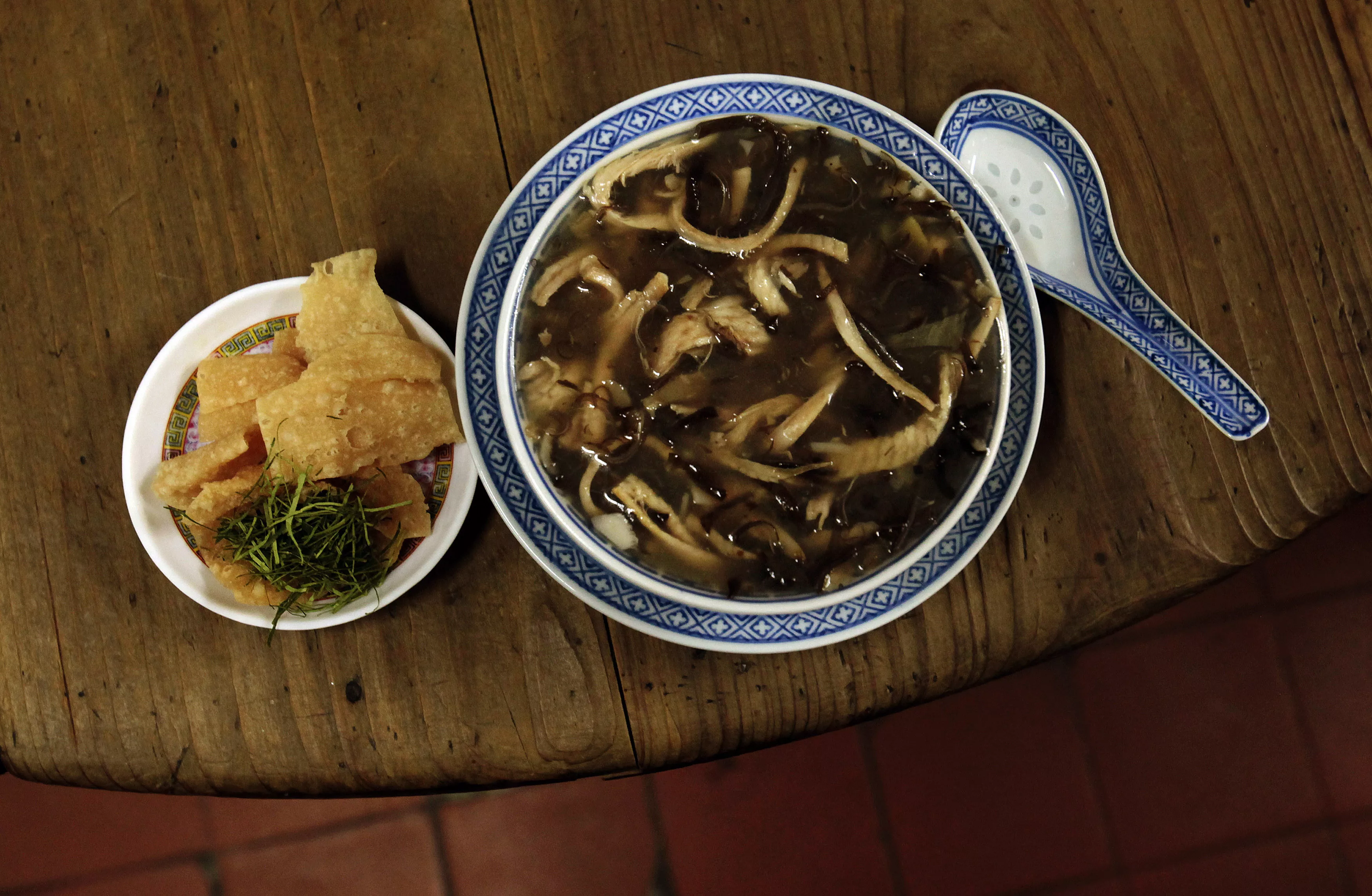 snake-meat-is-seen-in-a-bowl-of-snake-soup-served-at-a-snake-soup-shop-in-hong-kong