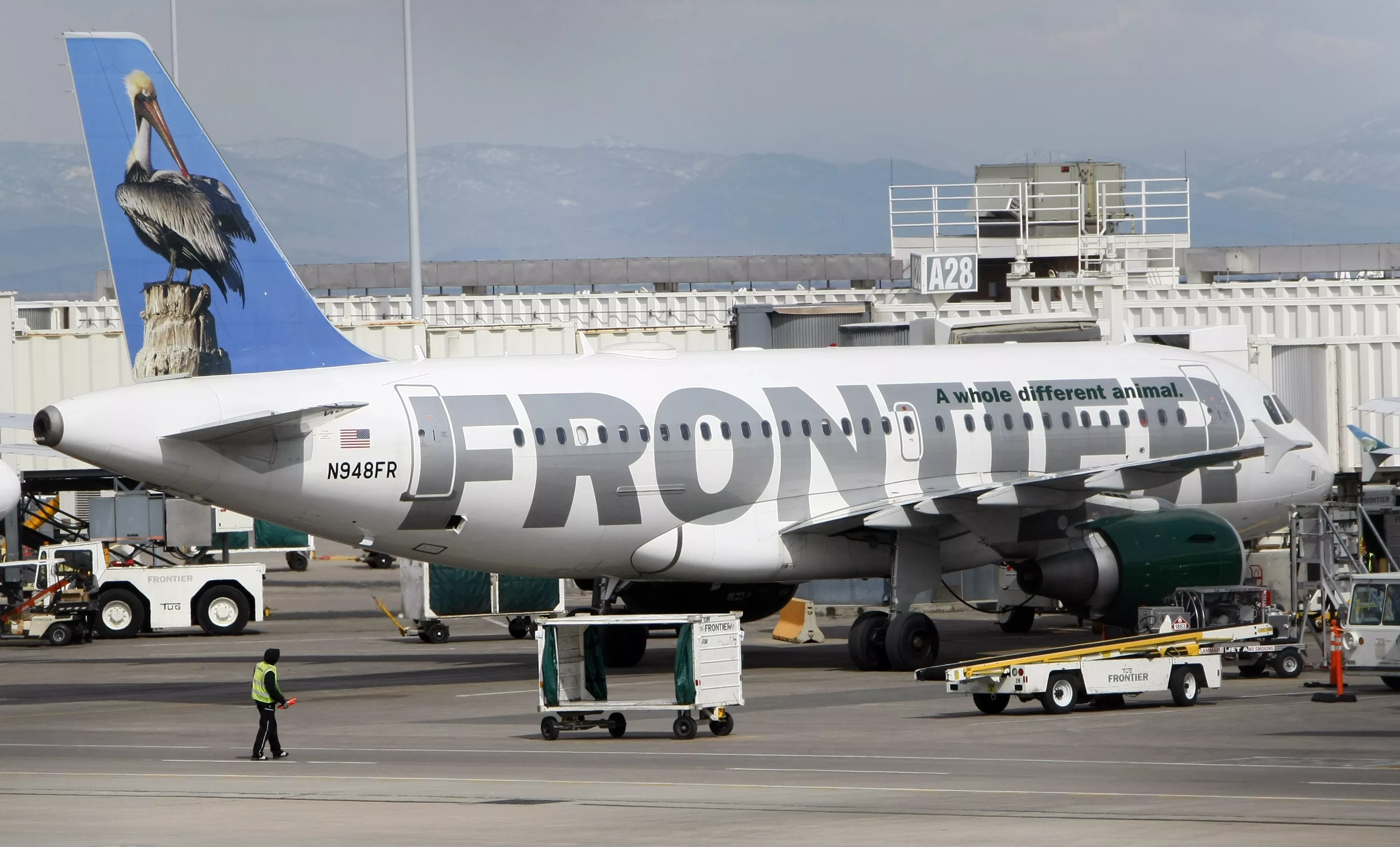 a-frontier-airlines-airbus-a319-jet-loads-at-the-denver-international-airport