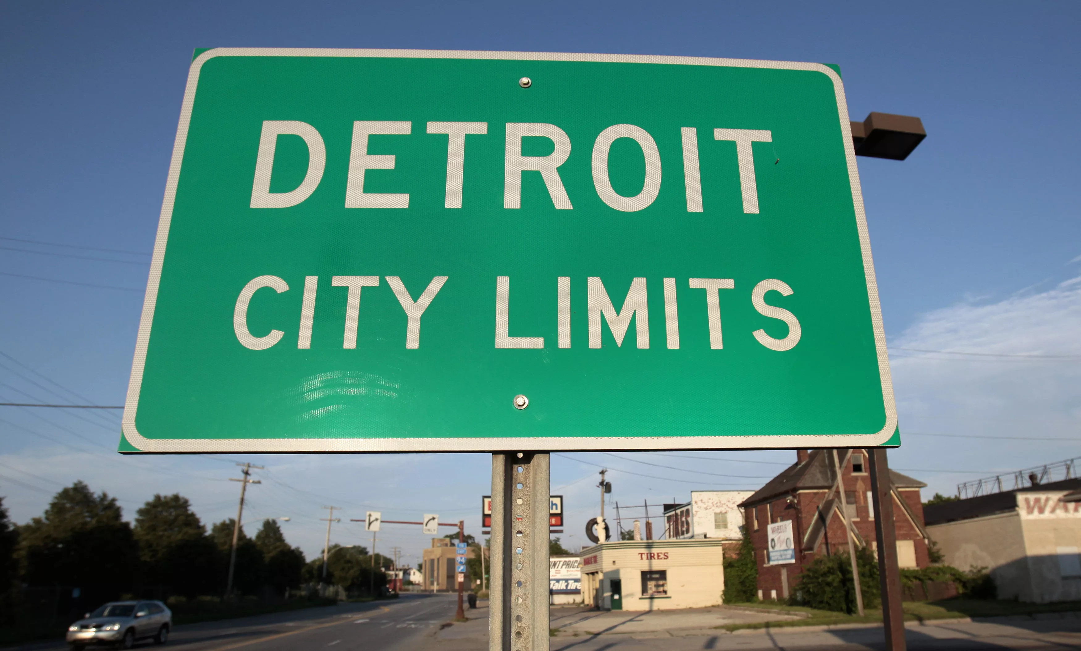 detroit-city-limits-border-sign-is-seen-as-traffic-enters-a-westside-neighborhood-in-detroit