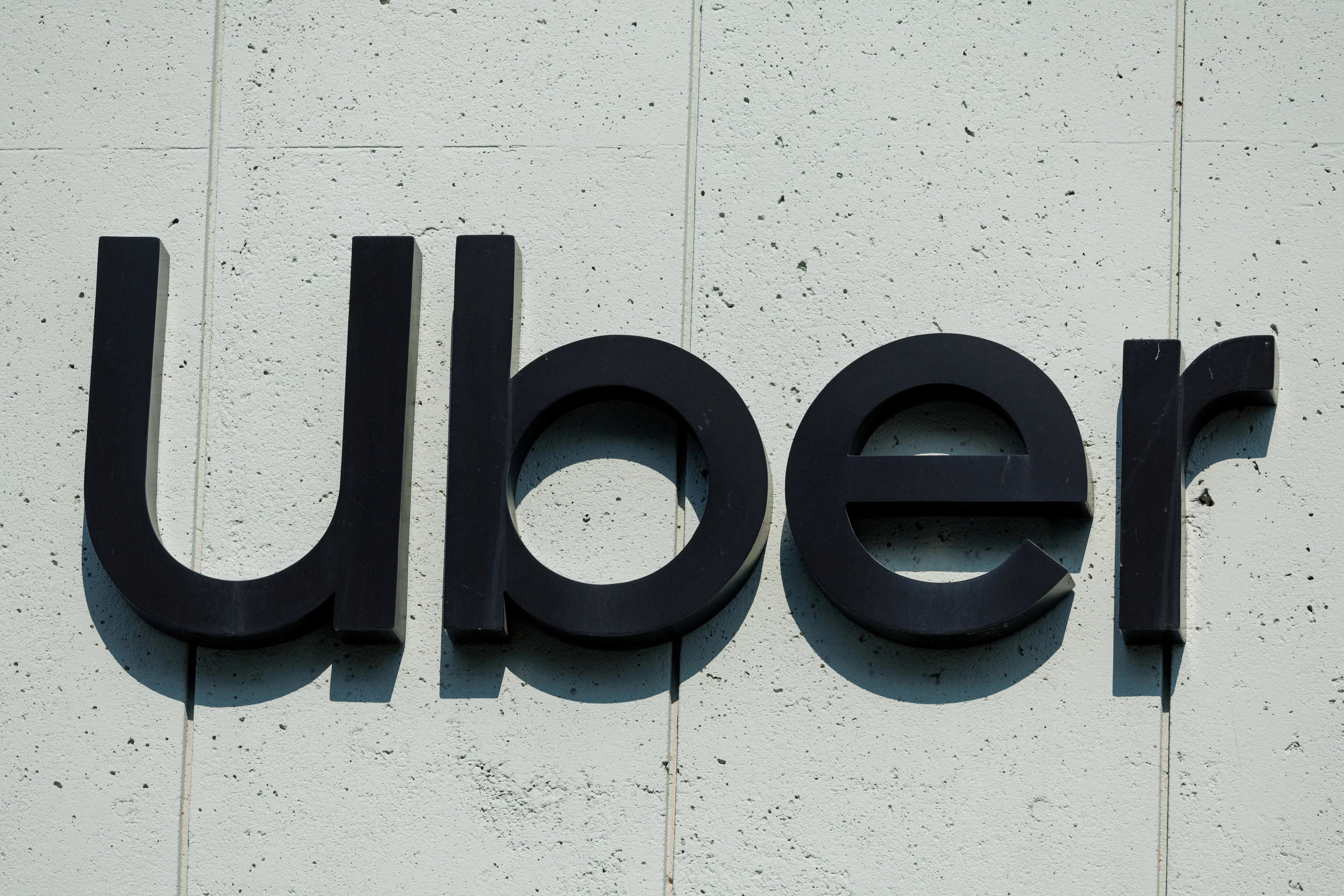 file-photo-the-uber-logo-is-shown-on-the-building-in-los-angeles