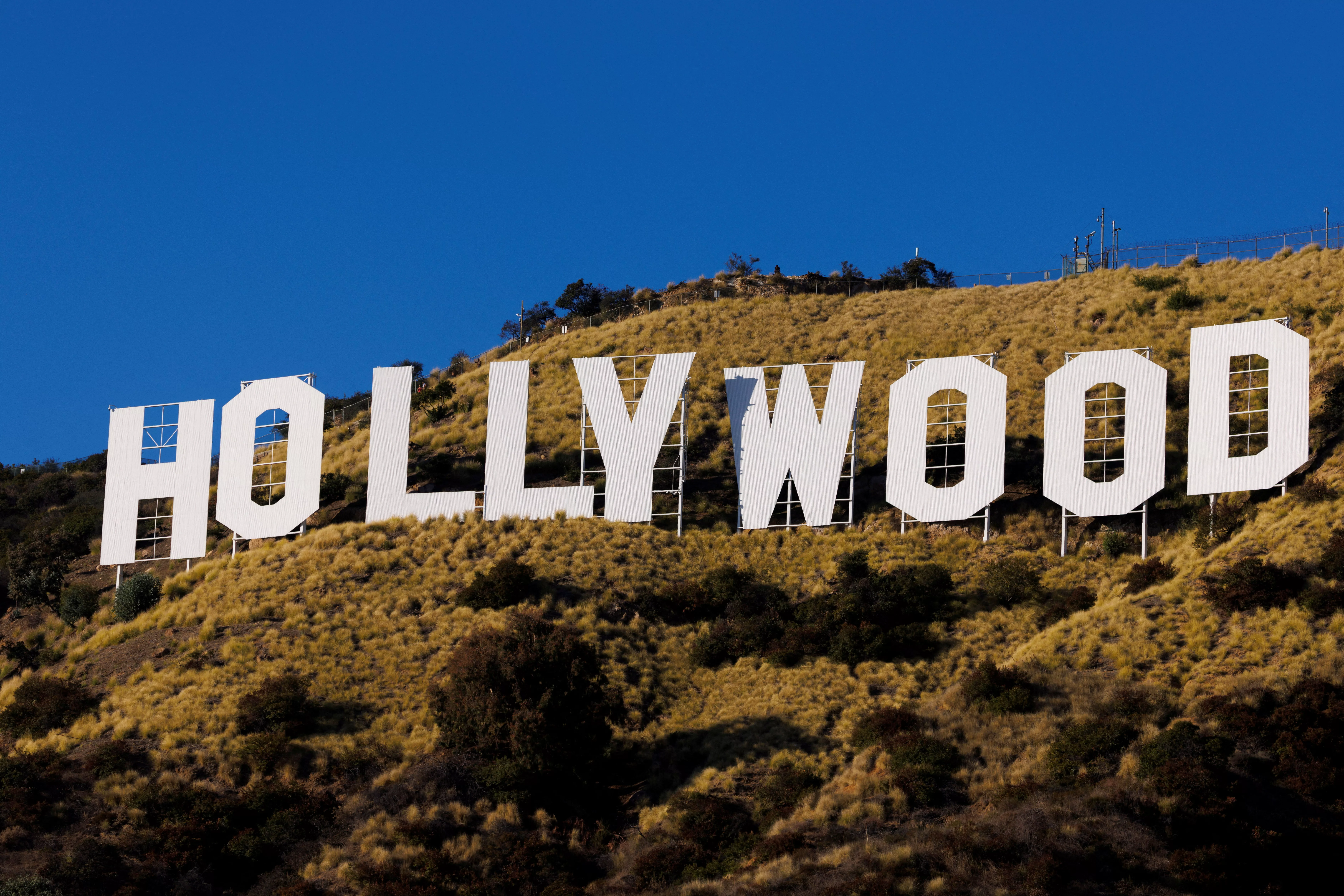 file-photo-iconic-hollywood-sign-celebrates-100th-birthday-of-being-lit-up-by-lights