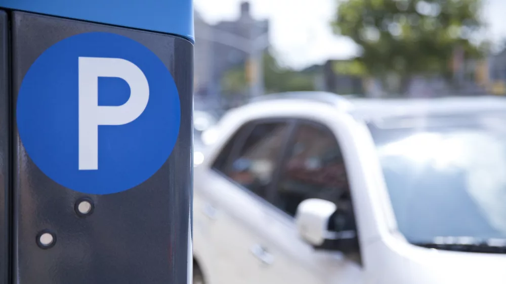 a-blue-parking-ticket-machine-beside-the-road
