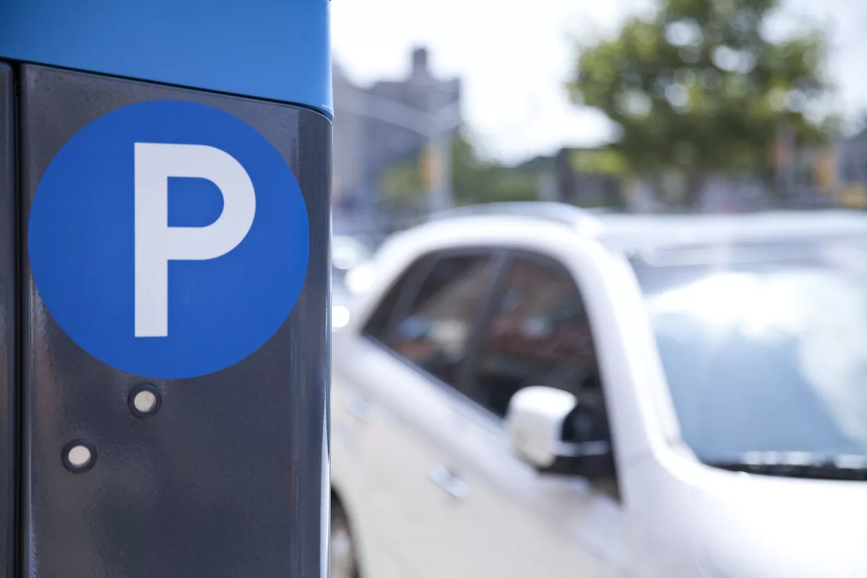 a-blue-parking-ticket-machine-beside-the-road