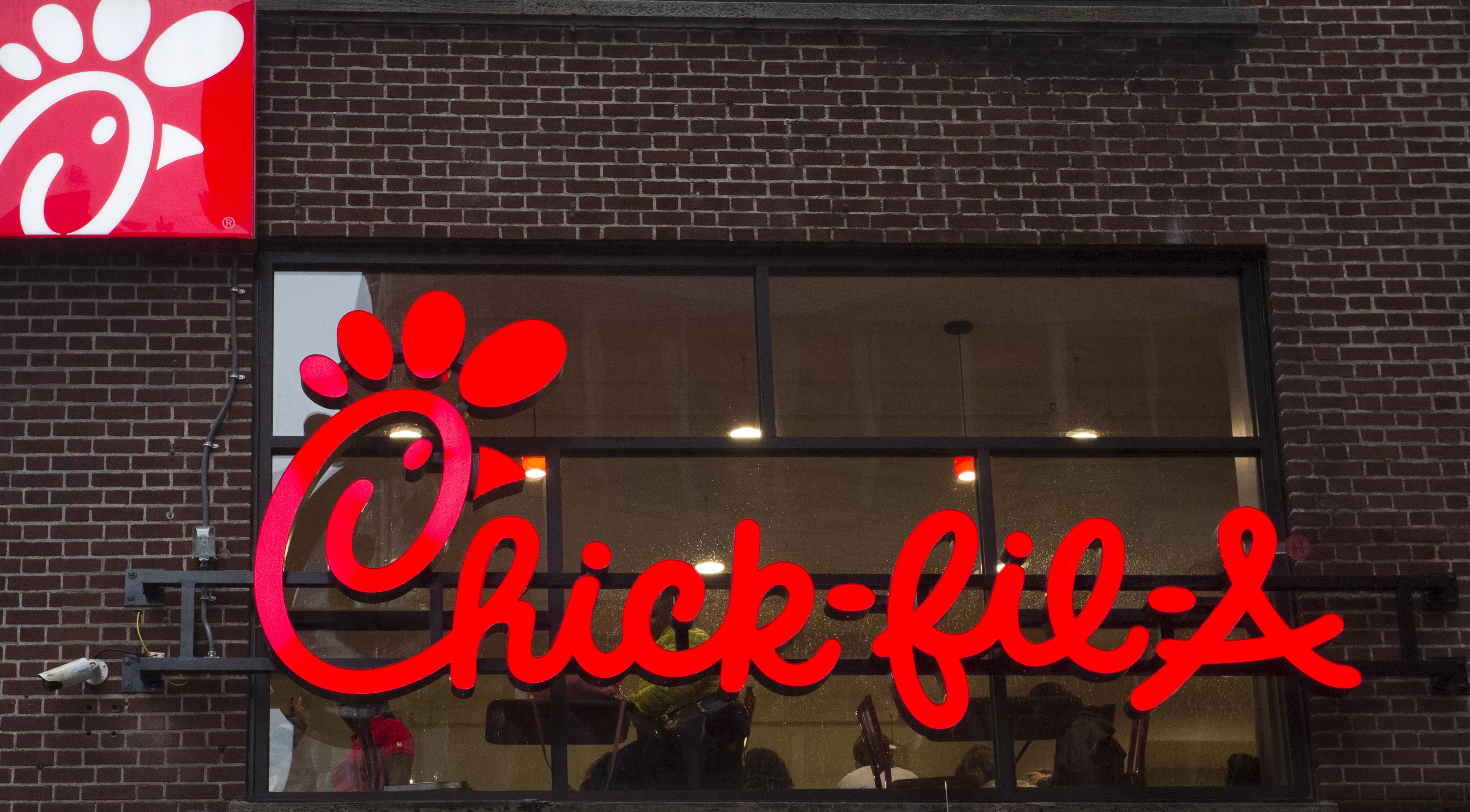 a-franchise-sign-is-seen-above-a-chick-fil-a-freestanding-restaurant-after-its-grand-opening-in-midtown-new-york